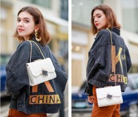 Клатч стеганий с металлической застежкой фото