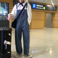 Легкий сплошной комбинезон с широкой штаниной фото