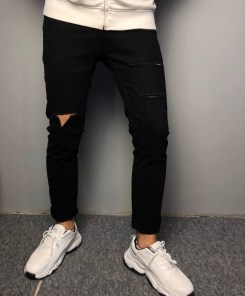 Мужские черные джинсы узкие с рваным коленом фото