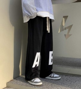 Штани в стиле хип-хоп с буквами на коленях фото