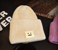 Большая женская шапка со смаилом фото