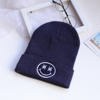 Шапка теплая со смайлом фото