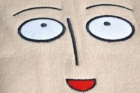 Шапка с мультяшным рисунком фото