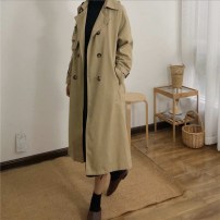 Длинный тренч пальто бежевый женский фото