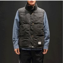 Теплый мужской дутый вельветовый жилет фото