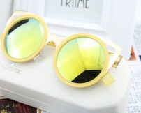 Женские круглые солнцезащитные очки с золотыми вставками фото