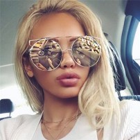 Круглые очки от солнца в металлической оправе фото