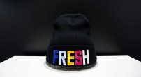 Теплая шапка разноцветной надписью FRESH фото