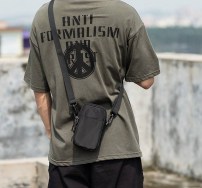 Черная мини сумка для телефона фото