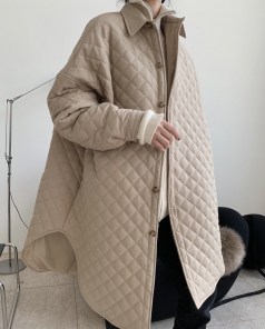 Женское легкое стеганое пальто пуховик фото