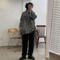 Женская джинсовка с цветными разводами и дырками фото