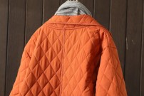 Женское легкое стеганое длинное пальто фото