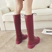 Женские высокие сапоги с длинной шнуровкой фото