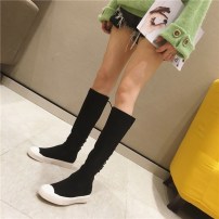 Высокие сапоги носки со  шнуровкой сзади фото