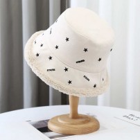 Зимняя женская панамка на меху со звездами фото