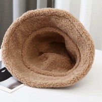 Зимняя женская панамка на меху со звездами фото