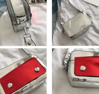 Глянцевый вместительный клатч фото