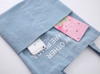 Вместительная тканевая сумка с большими карманами фото