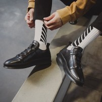 Однотонные мужские кроссовки - кеды с необычной шнуровкой фото