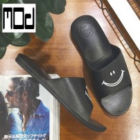 Однотонные тапочки с улыбкой фото