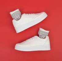 Женские кроссовки на высокой подошве фото