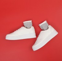 Женские кроссовки на высокой подошве фото